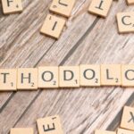 Research Techniques - The word methodology spelled out with scrabble tiles