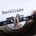 Backlinks - Gray Typewriter with White Paper