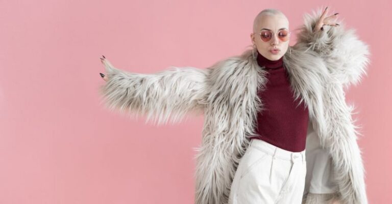 Content Trends - Fashionable woman in fur coat dancing in studio