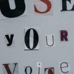 PPC Campaigns - Use Your Voice inscription on gray background