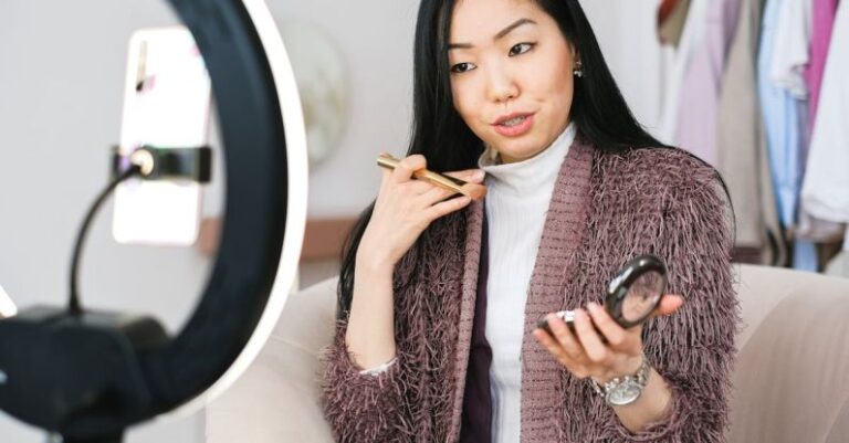 Live Streaming - Vlogger Applying Makeup and Live Streaming with her Phone